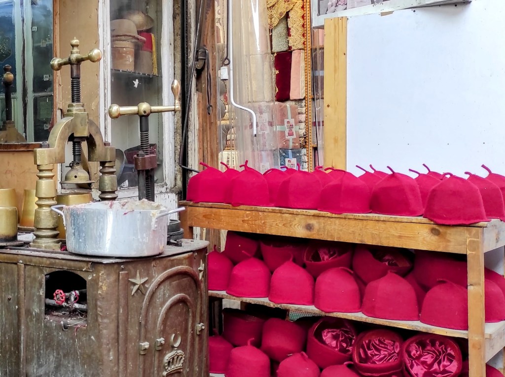 Rows of fez next to the workshop