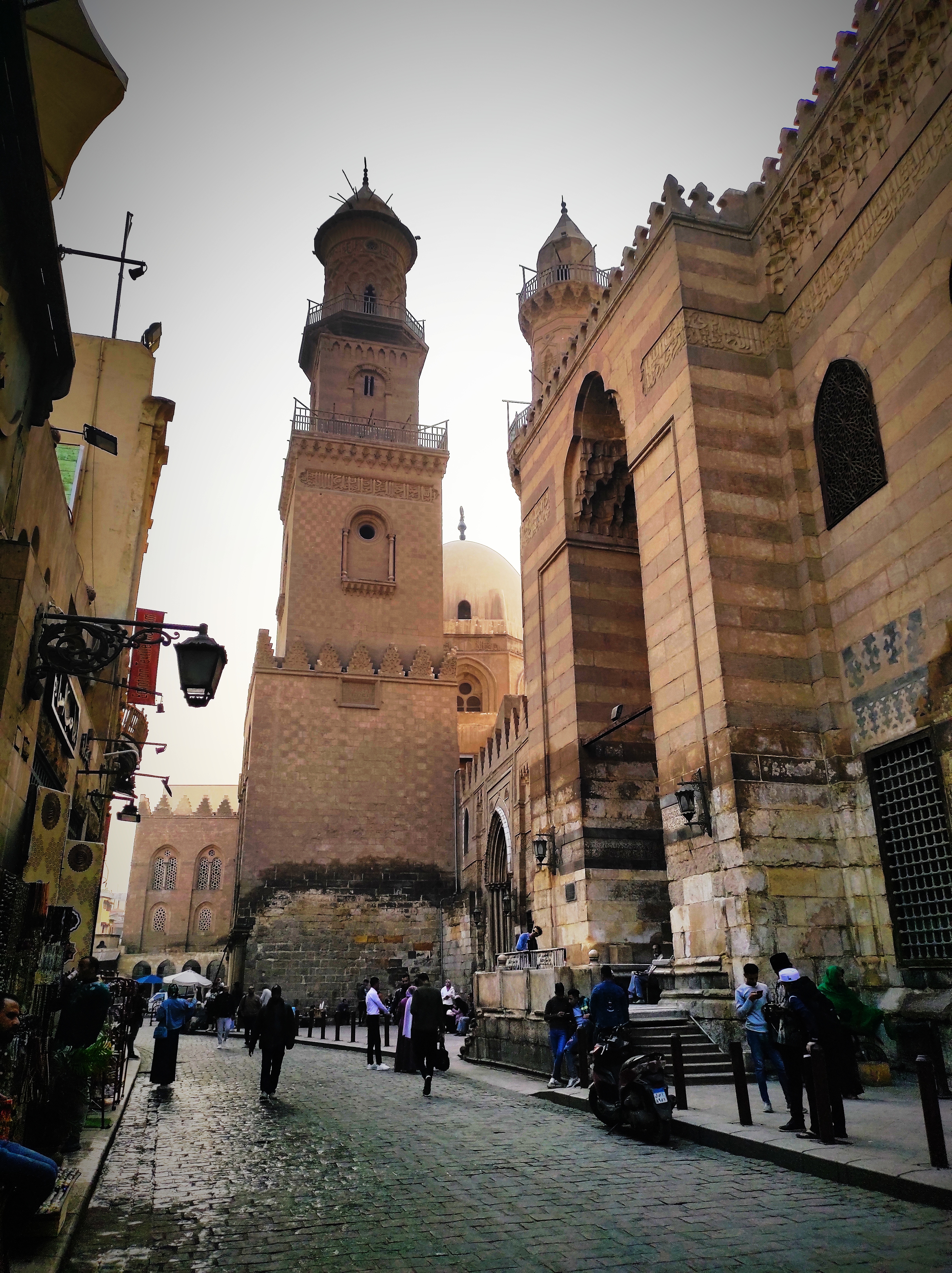 View of street and mosque in Islamic Cairo